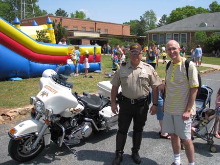 IMG_0871 meeting the sheriff - very proud of his new bike